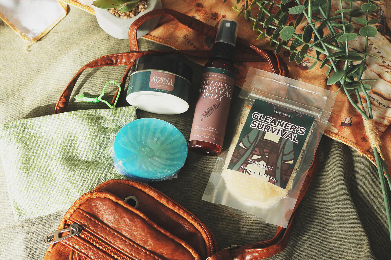 Inspired by "Erenville" (FFXIV). Holiday 2024 set consisting of: Body Lotion, Soap Bar, Room Spray, Bath Salt, and a leatherette pouch. Features my artwork on Bath Salt pouch.